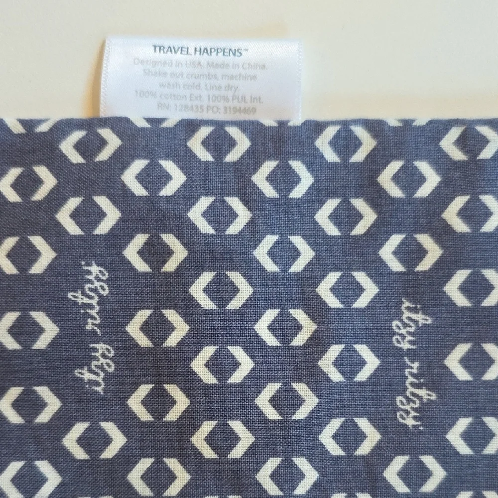 Itzy Ritzy Travel Happens Wet Bag -  Blue and White Patterned Zipper Bag